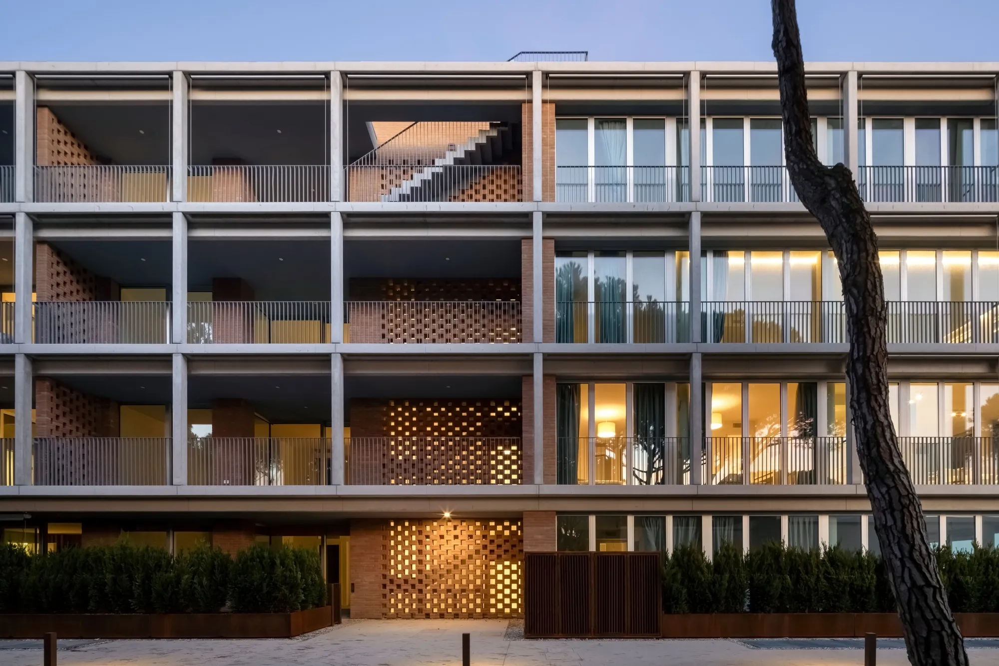 Three Studios Build a Seaside Residence in Jesolo That Mirrors a 1956 Hotel Through Brick and Concrete