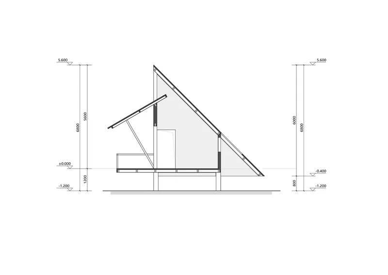 Section drawing revealing the steeply pitched roof and split-level interior volumes