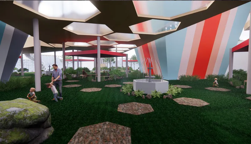 Open green interior court shaped by hexagonal skylights and cultural color bands.