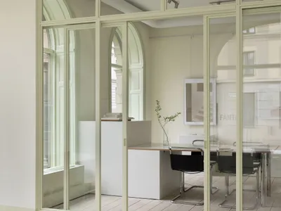 ASKA Turns a Patchwork of Stockholm Storefronts into Fantastic Frank's Pistachio-Green Showroom