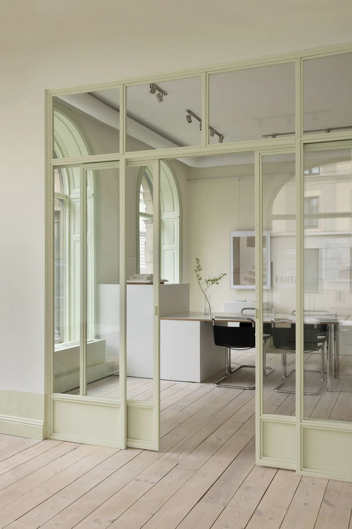 ASKA Turns a Patchwork of Stockholm Storefronts into Fantastic Frank's Pistachio-Green Showroom
