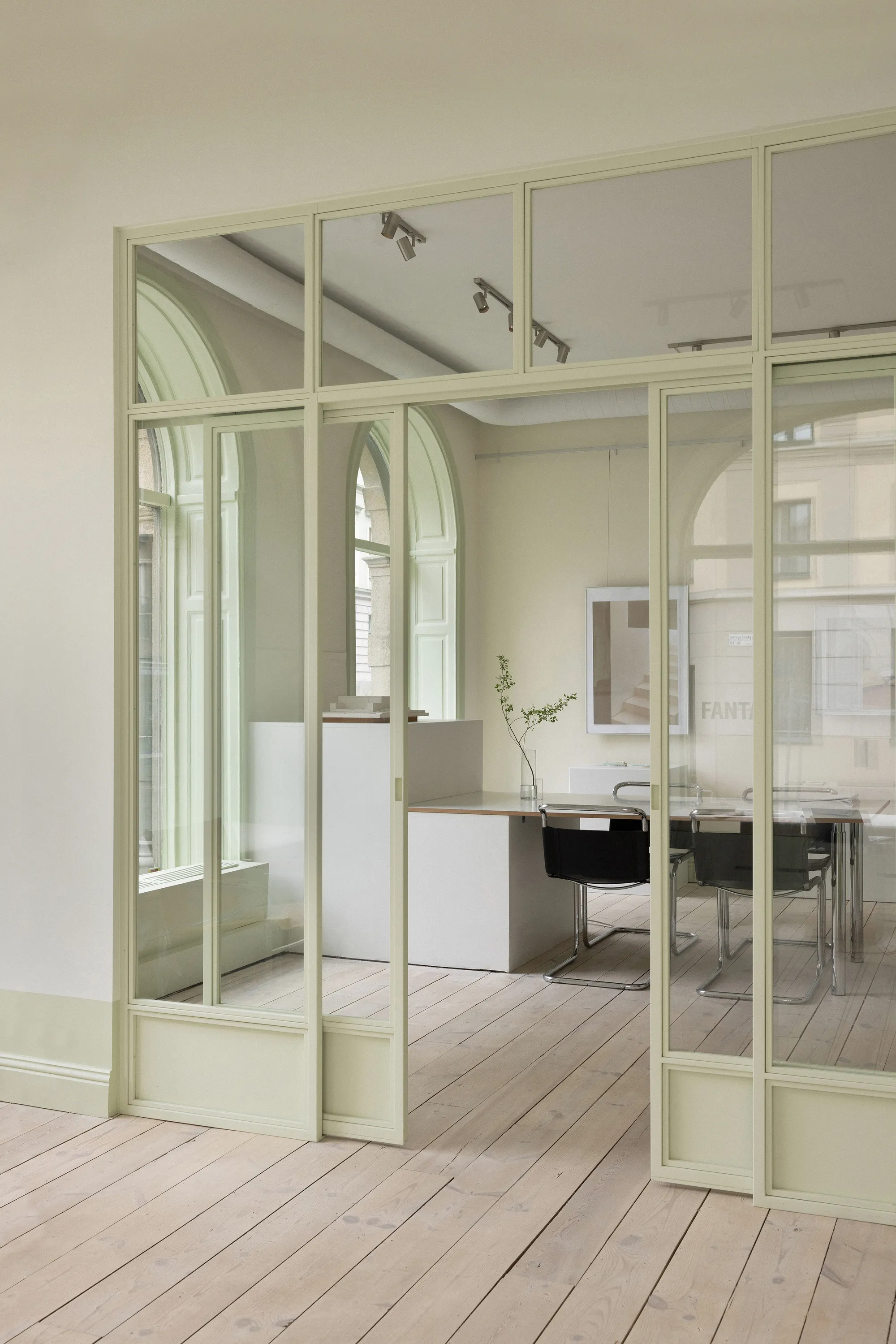 ASKA Turns a Patchwork of Stockholm Storefronts into Fantastic Frank's Pistachio-Green Showroom