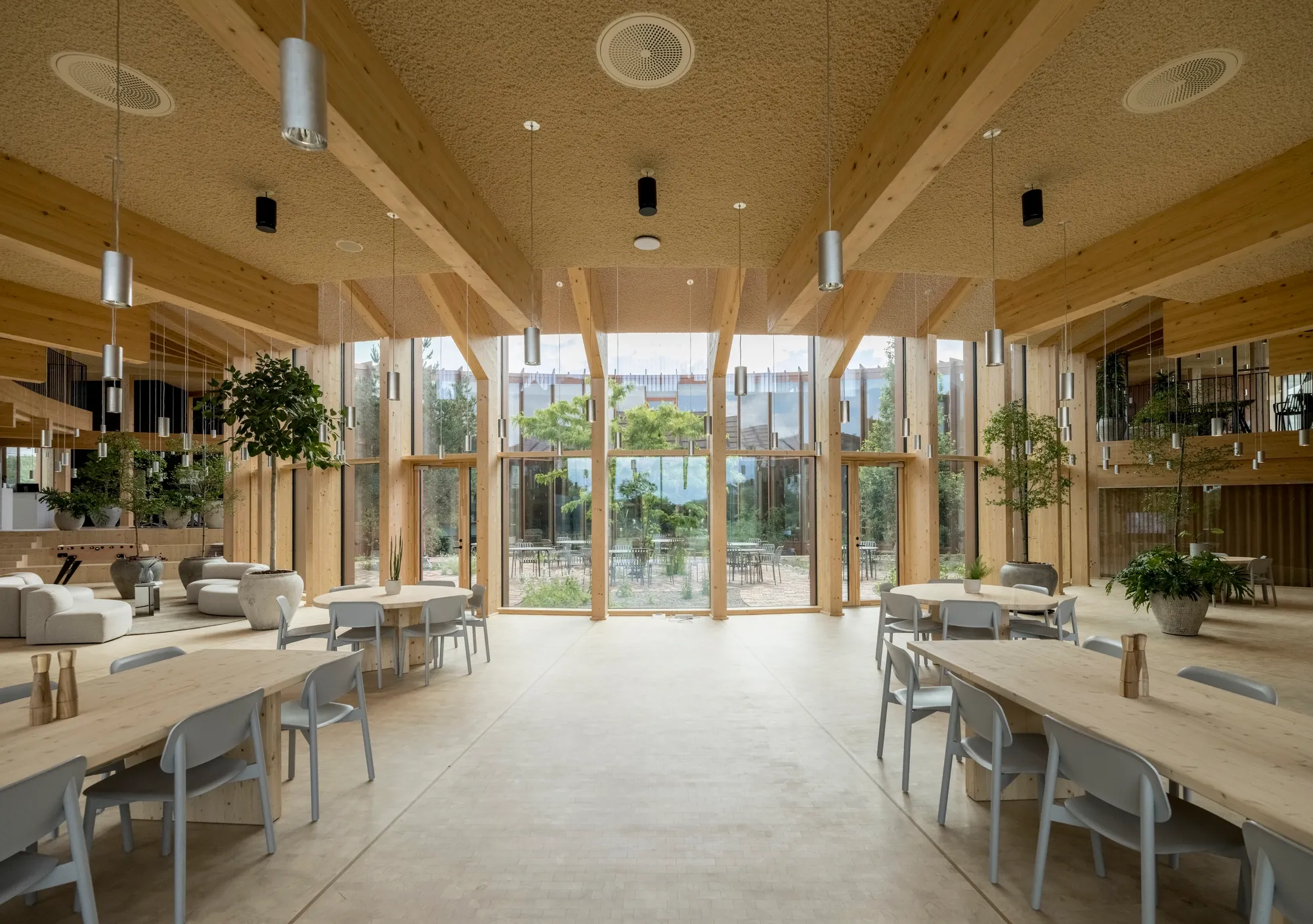 BIG Wraps a Circular Timber Headquarters Around a Courtyard on the Edge of Odense