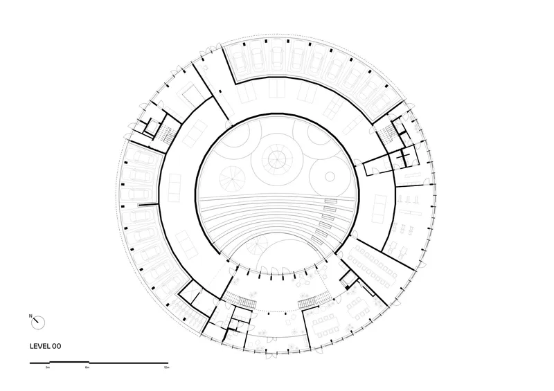 Ground floor plan drawing of a circular building with perimeter rooms around a central courtyard