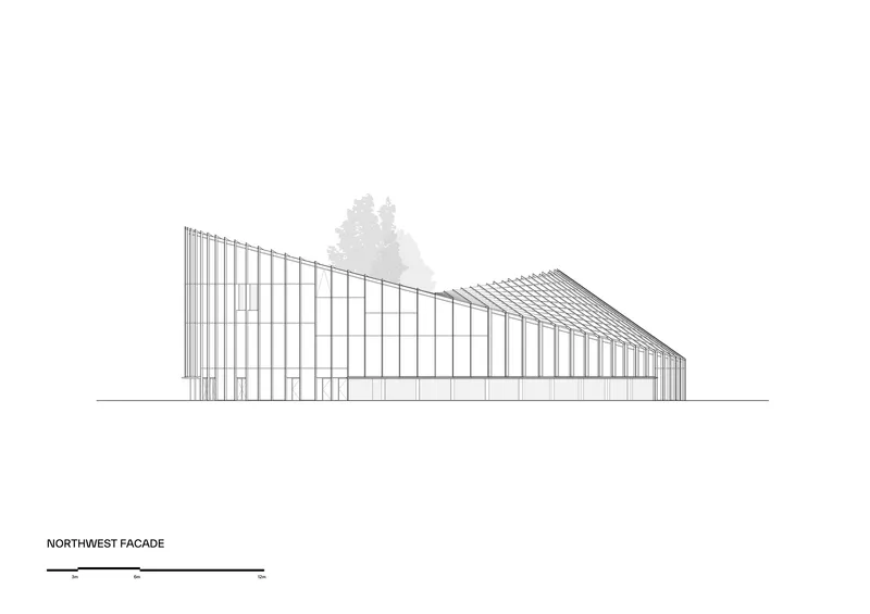 Northwest facade elevation drawing showing the sloped vertical-ribbed envelope descending from left to right with background trees