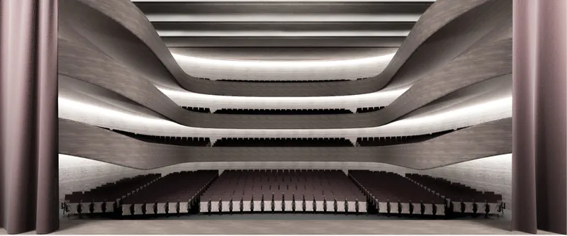The layered main auditorium creates an immersive opera setting