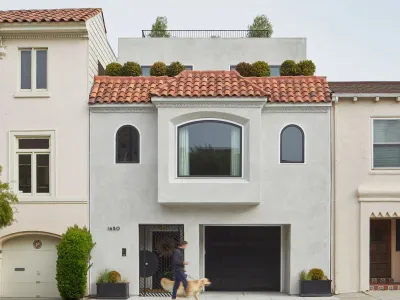 The Wraparound House by SAW is a beautiful example of a 1930s Spanish Revival home, situated in San Francisco.