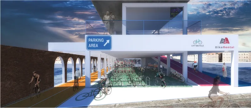 View through the covered bike parking area showing white columns, brick arches, and colored floor zones with cyclists