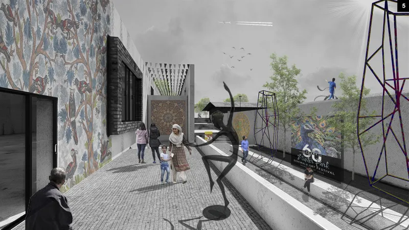 Elevated walkway with patterned paving, steel play structures, and murals on adjacent building walls