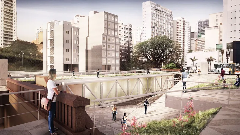 Elevated pedestrian bridge with white triangular trusses crossing over a lower plaza with people and planted beds