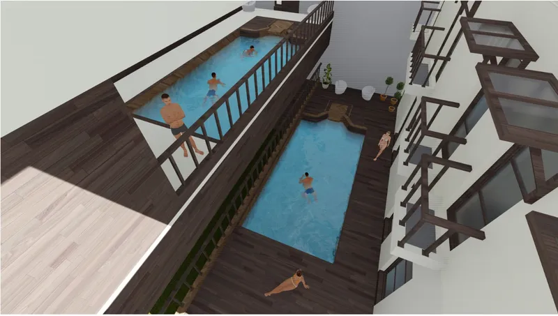 Overhead view of the split-level pool area with timber decks and bathers in the blue water