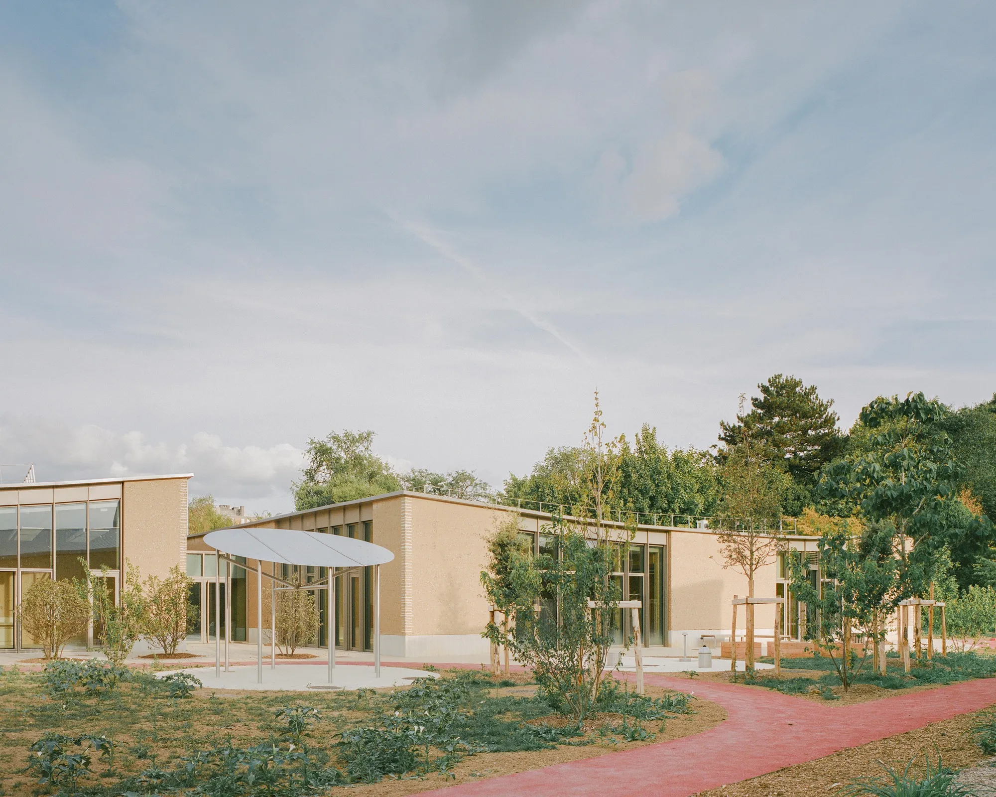 Parc des Loges Childhood and Sports Center By HEMAA Architectes