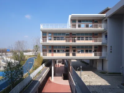 Expansion and Renovation of Primary School & Urban Infrastructure Multi-system Complex by Atelier Archmixing