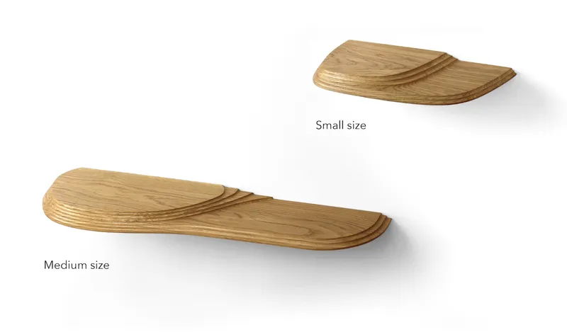 Two laminated wood wall shelves in small and medium sizes displayed on a white surface