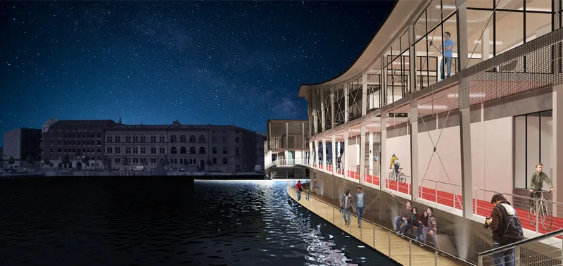 Night rendering of the illuminated glass facade with cyclists inside and pedestrians along the waterfront promenade
