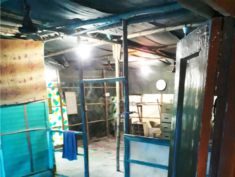 Interior conditions of refugee shelters showing incremental construction and material adaptation over time.