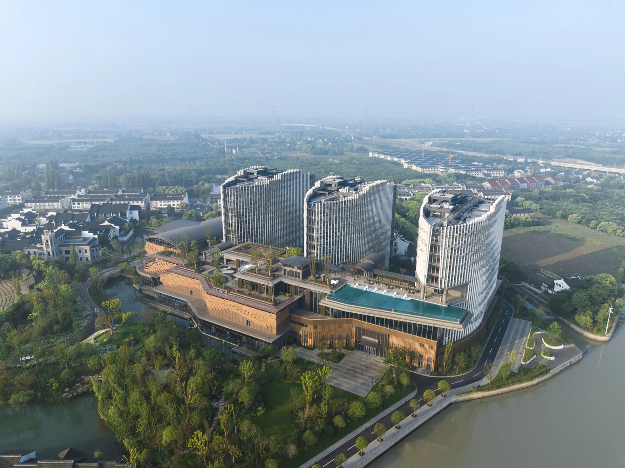 Wuzhen Vessel Hotel Façade Design by workshopXZ: A Modern Interpretation of Traditional Chinese Maritime Heritage