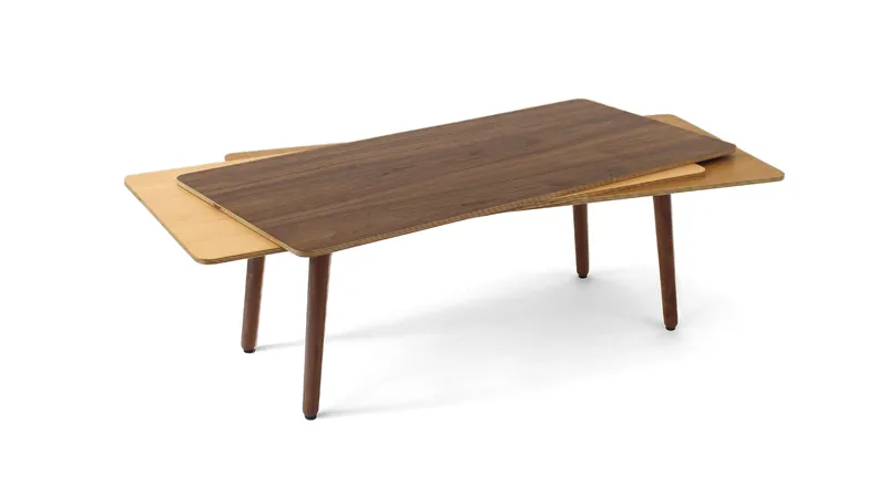 Layered plywood surfaces create a dynamic coffee table inspired by casually stacked cards.