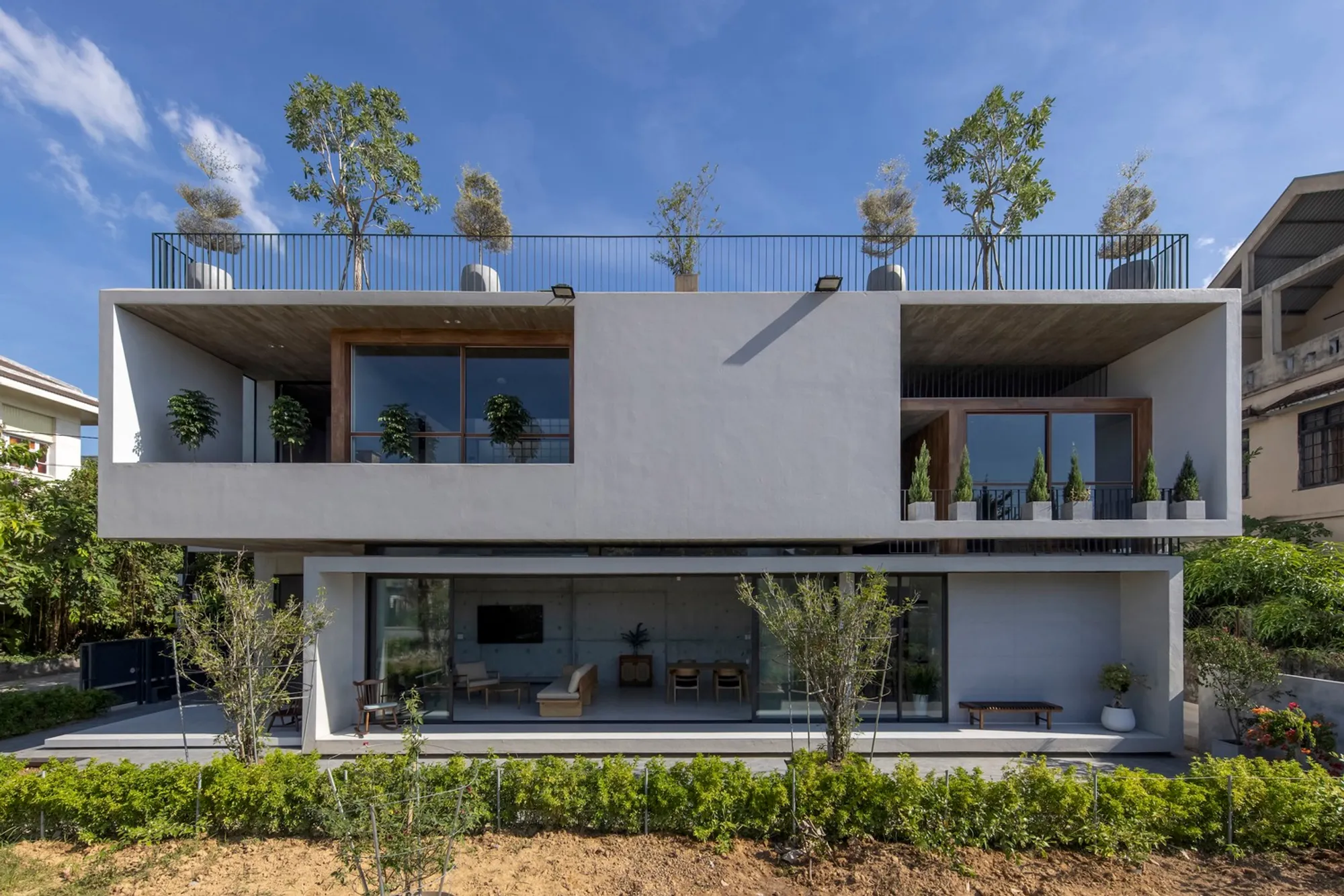 PVT House by Cote Architects: A Concrete Sanctuary Connected to Nature in Huế, Vietnam