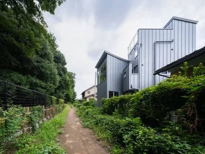 House in Koganei (SA House) / OFA: A Contemporary Timber Home Framed by Greenery