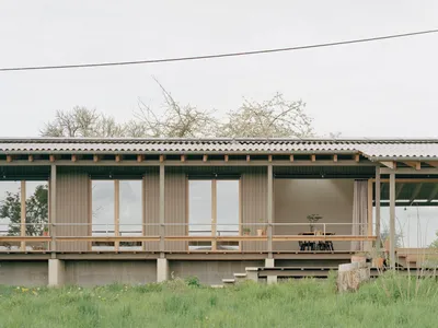 A Timber Family Home Embedded in the Rural Landscape of Southwest Germany