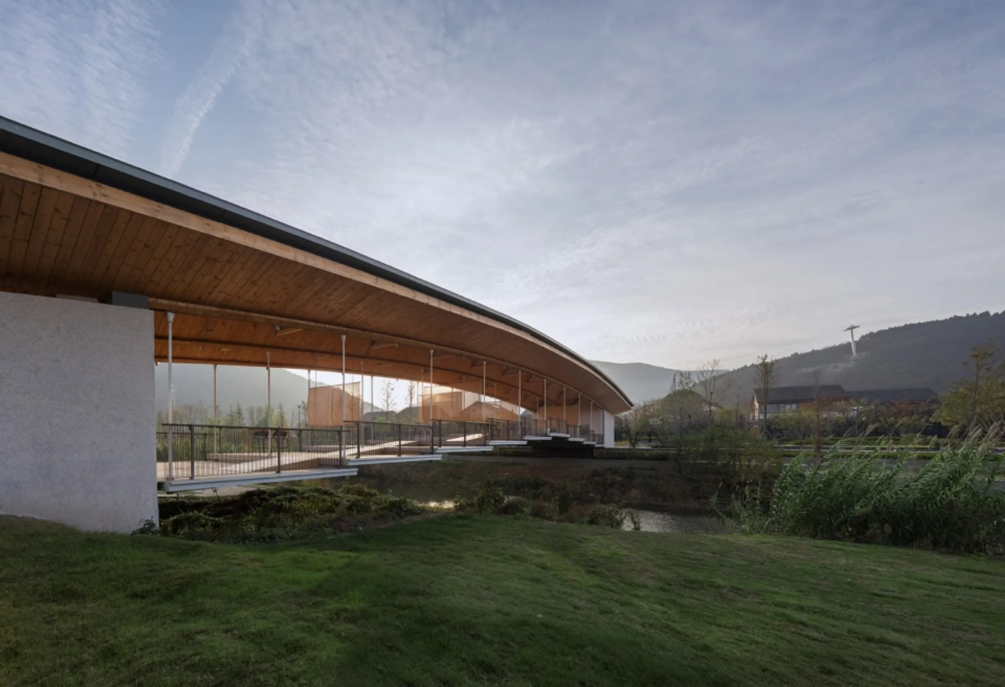 Scenic Architecture Office Creates a Stunning Bridge of Nine Terraces at Nanjing’s Horticultural Expo Village