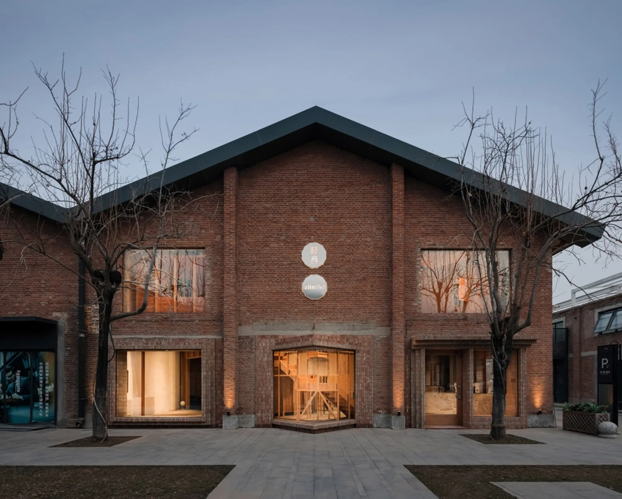 Atelier tao+c Transforms an Old Textile Warehouse into a Stunning Showroom for ZIIN Furniture
