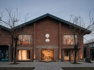 Atelier tao+c Transforms an Old Textile Warehouse into a Stunning Showroom for ZIIN Furniture