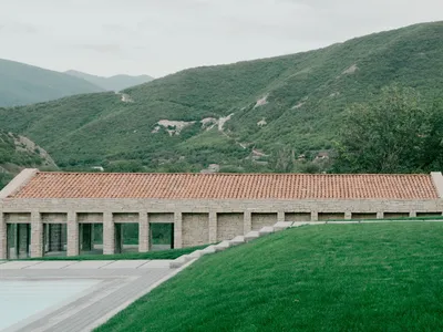 Modern Stone House Design: A Harmony of Tradition and Innovation in Tvaladi