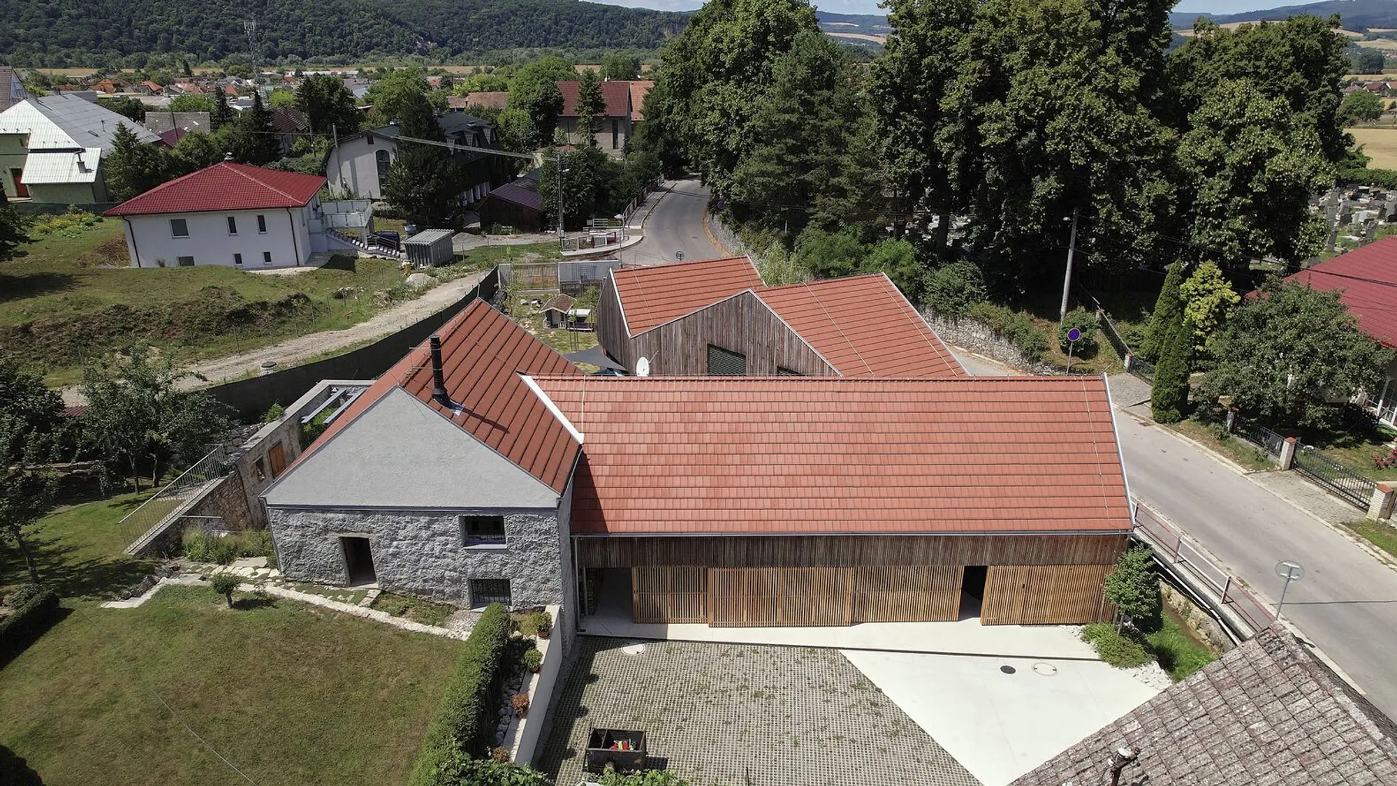 Modern Rural Architecture: Integrating Tradition with Innovation in the New House with Old Mill by RDTH architekti