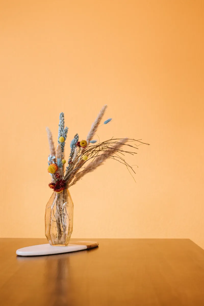 Flower arrangements can fill a home with vitality. Chris Tombrella / Pexels