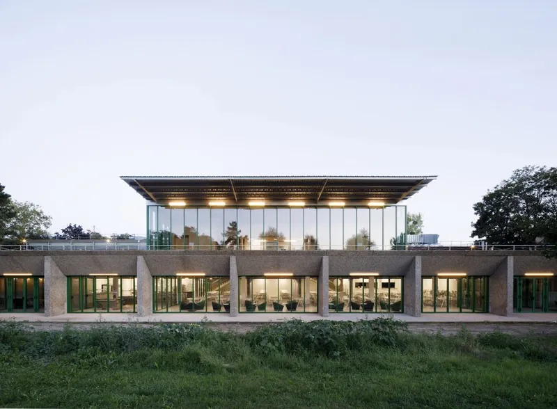 We are focusing our interest on the production rather than the sum of the building,’ says Carlo Grispello, co-founder of Graal Architecture. In their  2021 university cafeteria in Cergy‑Pontoise,  this means retaining the integrity of an existing building and adding to it with an economy of means