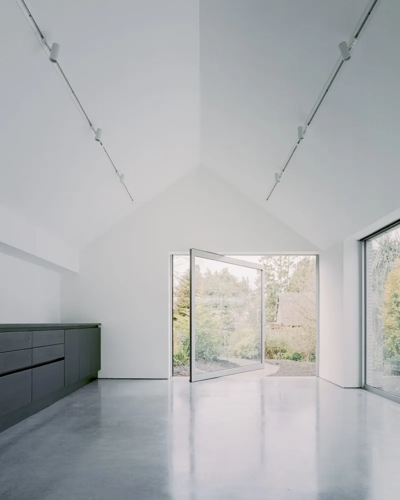 Over the edge pivoting doors