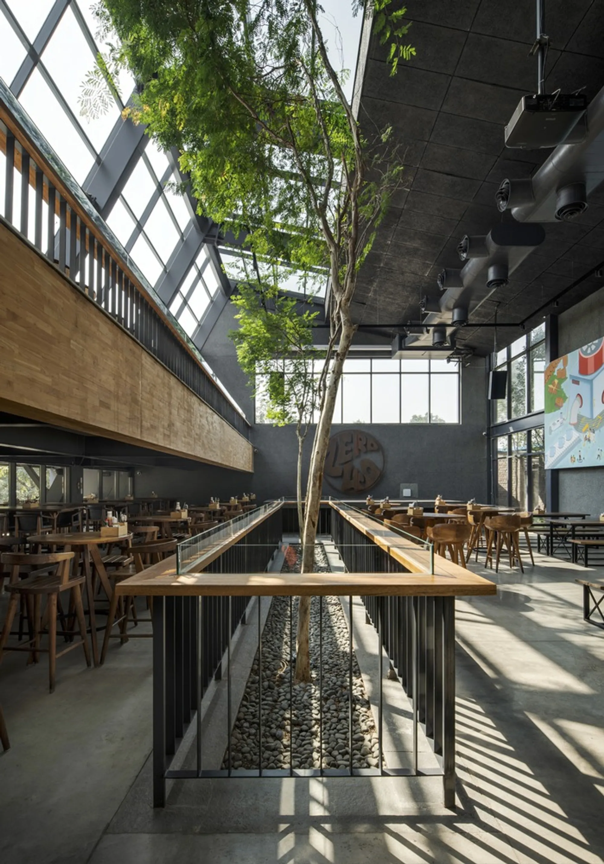 23 Degrees Design Shift Builds a Brewery Around an Orchard in Hyderabad's Tech District