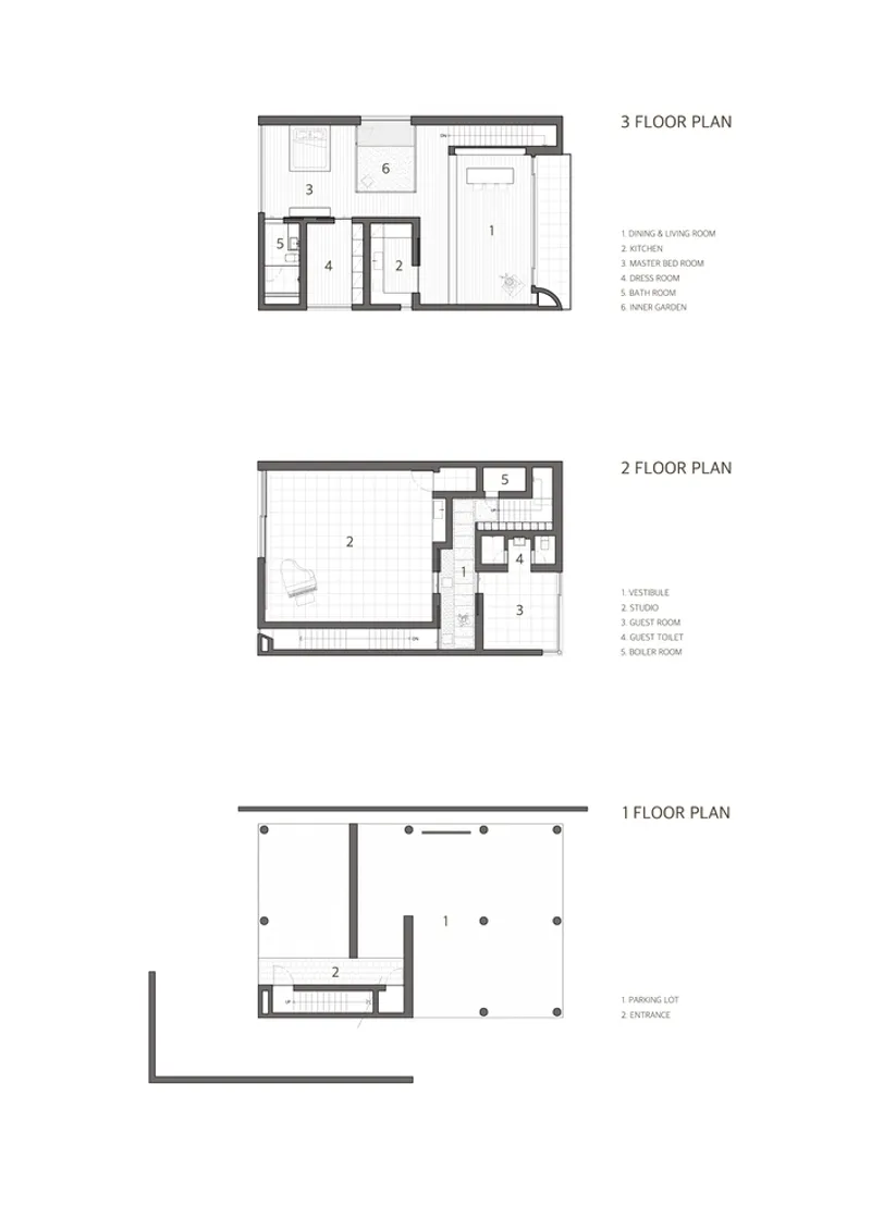 Floor plan drawings showing three levels of a residence with parking below and living spaces above