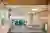This image showcases a modern hospital room designed for patient comfort and functionality. The room