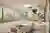 This architectural image showcases a modern hospital room featuring a patient bed with medical equip