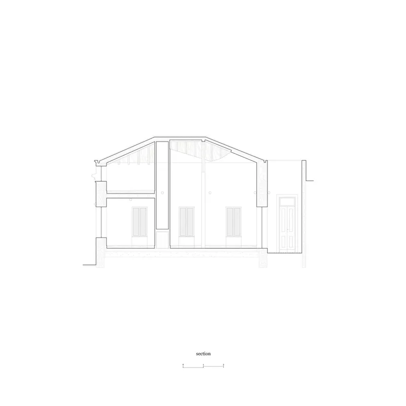 Second section showing the pine rafter structure and the wall cuts between rooms