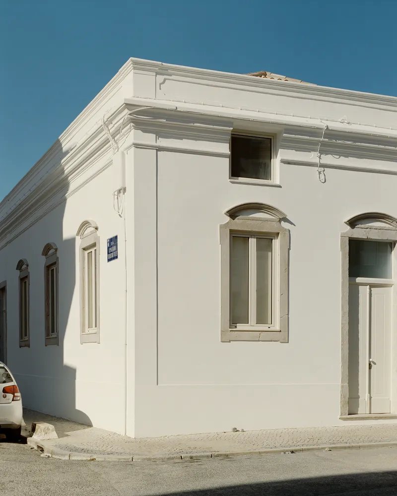 Corner of the house showing both restored elevations meeting at the street junction
